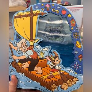 Loungefly Blue and Yellow Raft Pinocchio Backpack